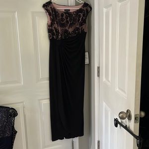 Beautiful new with tags black with pink upper backing behind lace